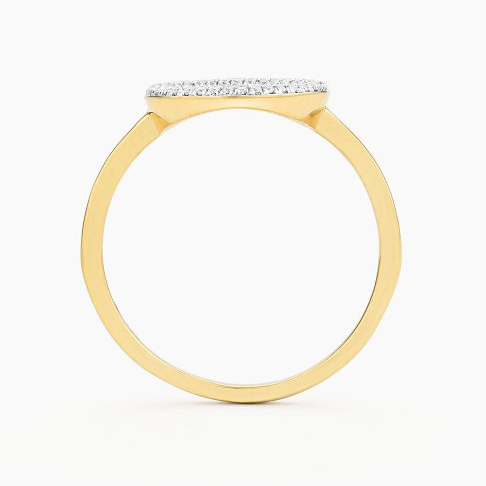 Silver statement ring with a diamond circle symbolizing infinite love.