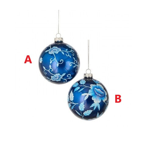 Glass ball ornament with a floral pattern in red and green tones.