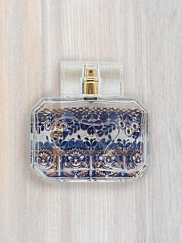Dream Eau De Parfum bottle with white tea and honeysuckle notes in a clear glass container.