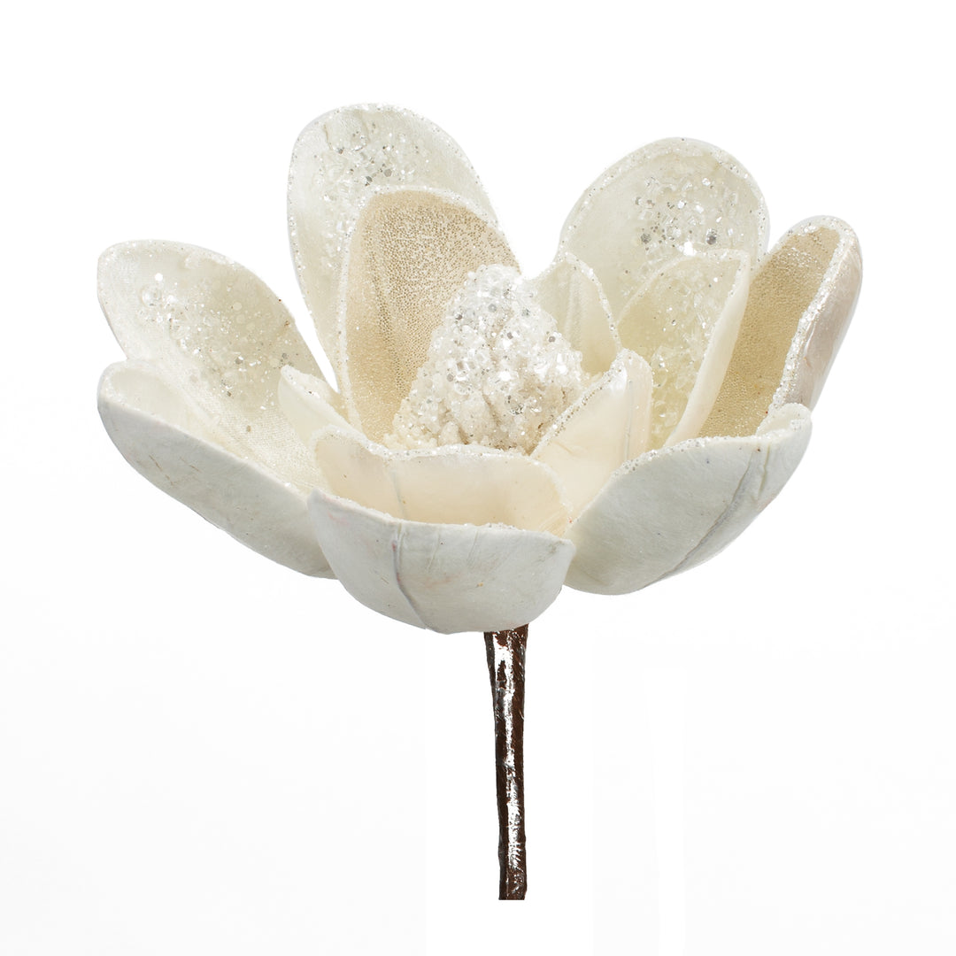 White velvet magnolia stem with glitter accents on the petals and center.