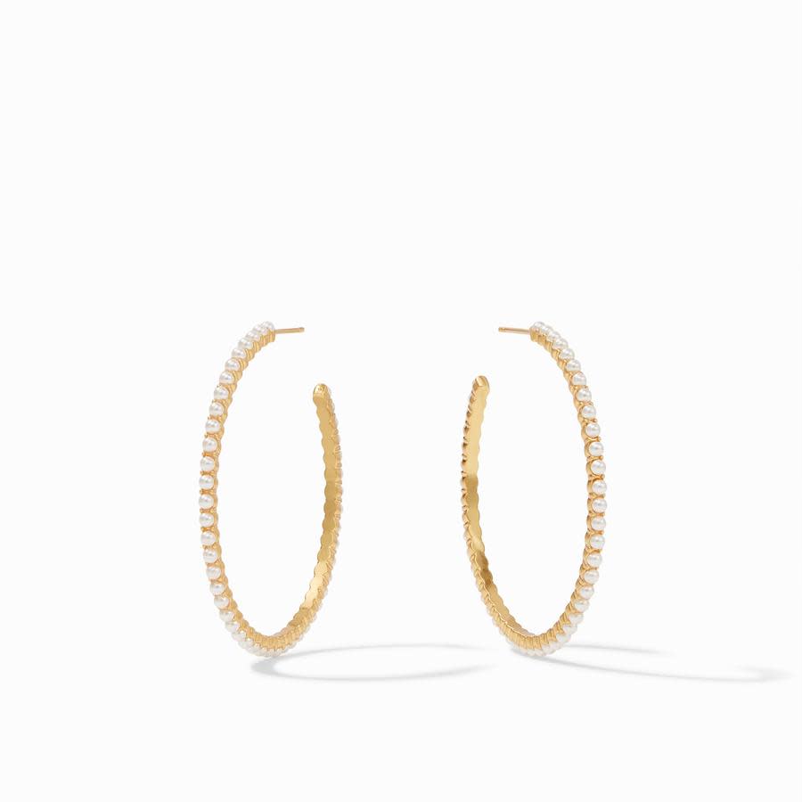 Juliet Hoop Gold earrings featuring large 18K gold-plated hoops lined with small white pearls.