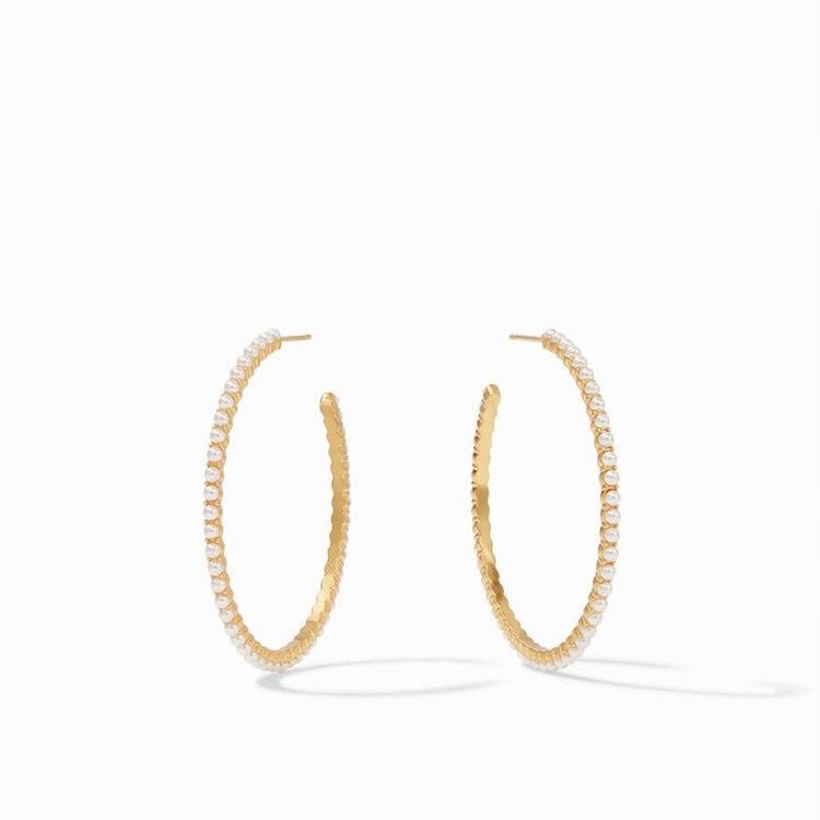 Juliet Hoop Gold earrings featuring large 18K gold-plated hoops lined with small white pearls.