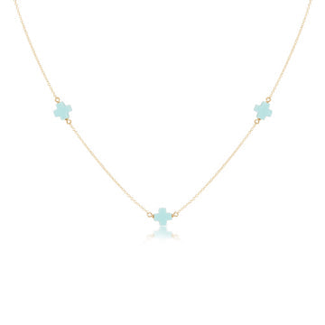 Gold-filled choker necklace featuring a signature cross pendant on a chain.