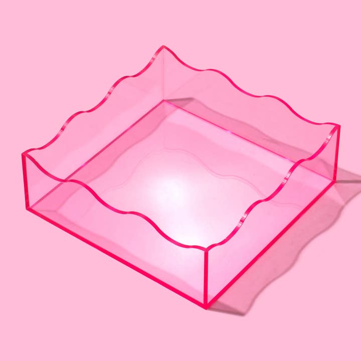 Acrylic wavy square tray measuring six inches by six inches with a two-inch height.