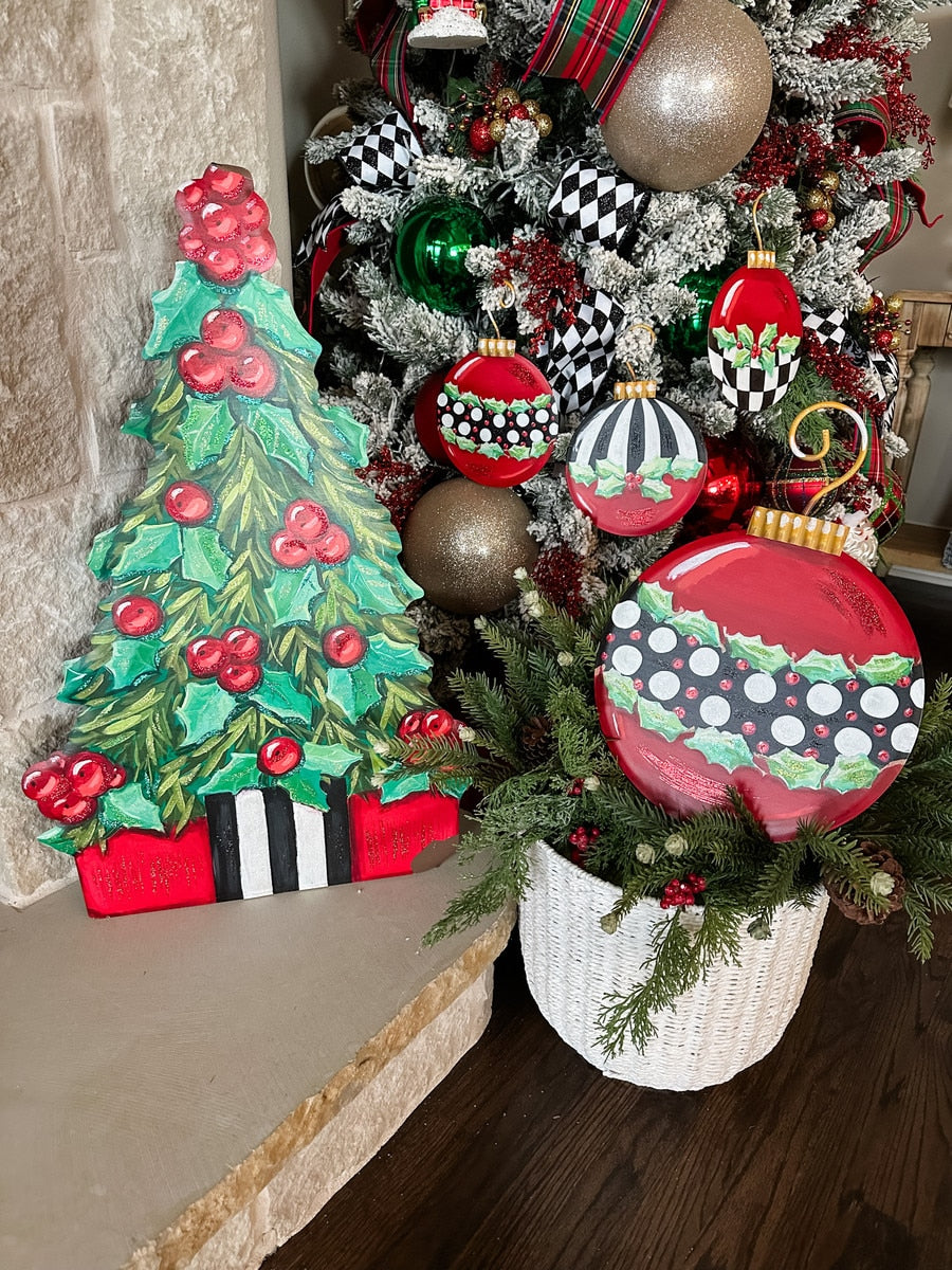 Elegant holly berry tree stake with green foliage, red berries, and gold accents.