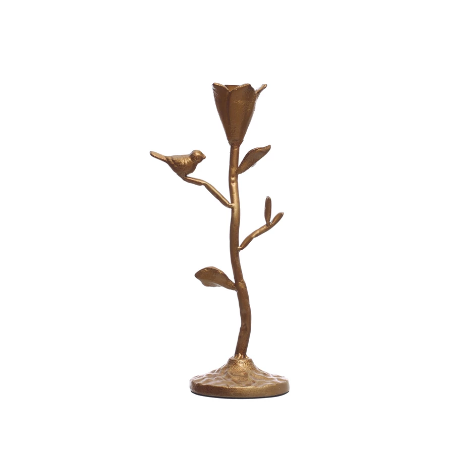 Gold hand-forged iron candle holder shaped like a branch with a bird and flower bud.