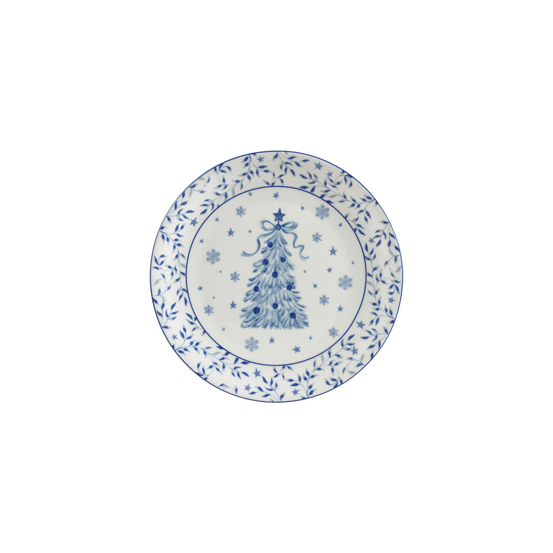 White stoneware plate with a blue Christmas tree design, snowflakes, and a leafy vine border.