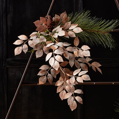 38-inch tall polyester glitter leaf spray with a natural green foliage pattern.
