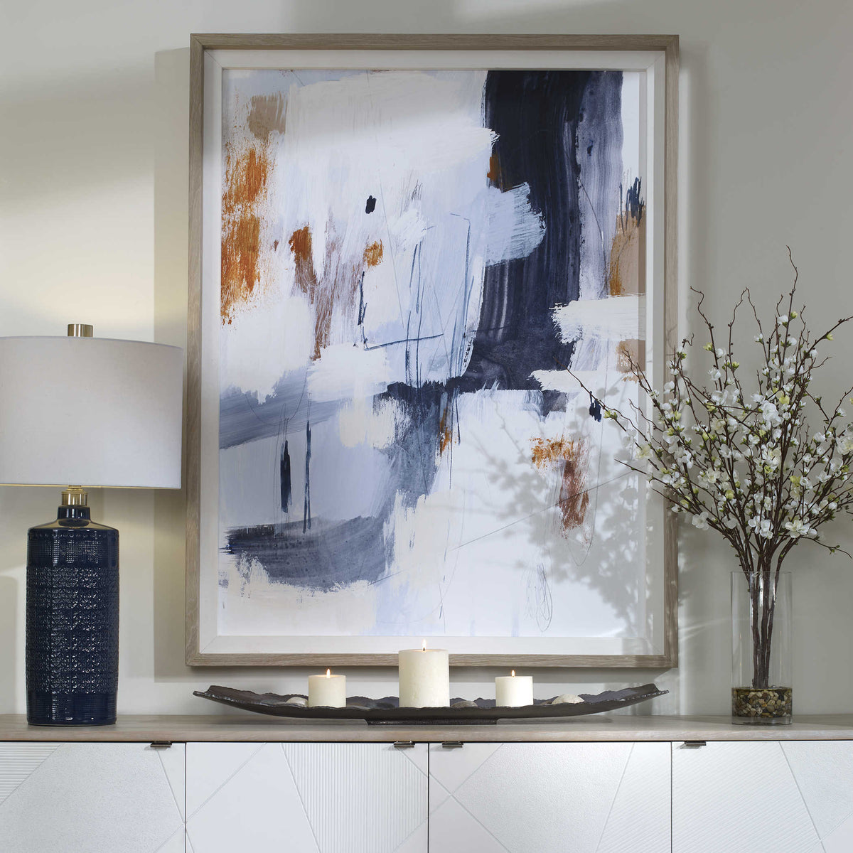 Abstract framed print with blue, white, and rust tones, 41x53 inches.