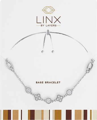 Silver clover charm on a hypoallergenic LINX base bracelet with cubic zirconia accents.