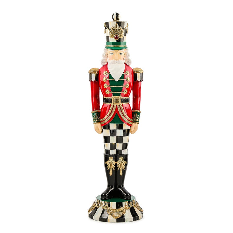 Courtly Classic Resin Nutcracker in a red jacket and black and white checkered pants.