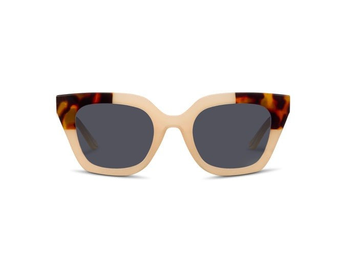 Nell Reading Sun sunglasses with recycled polycarbonate frames in a bold silhouette featuring polarized lenses and spring hinges.