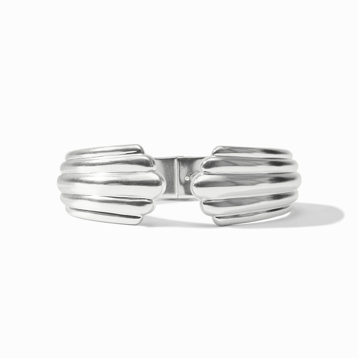 Portofino Statement Cuff in polished gold-tone metal with a spring hinge closure.