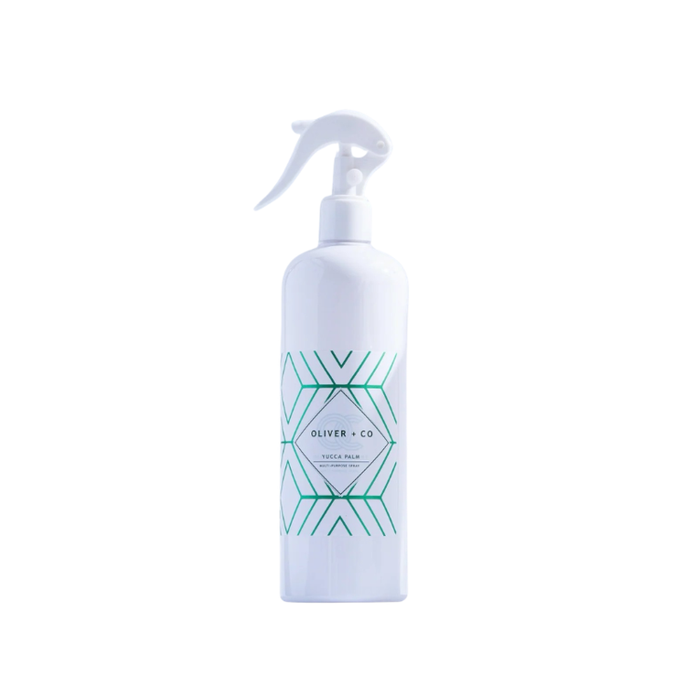 White spray bottle of Oliver + Co Yucca Palm Multi-Purpose Cleaner with green geometric label.