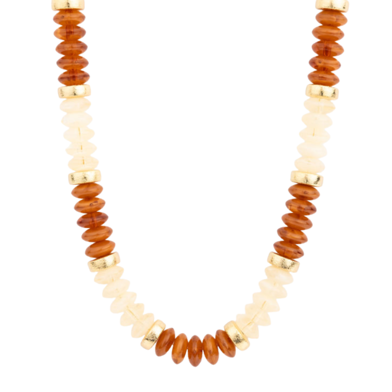Jules Necklace featuring alternating sections of amber and cream beads separated by gold spacers.