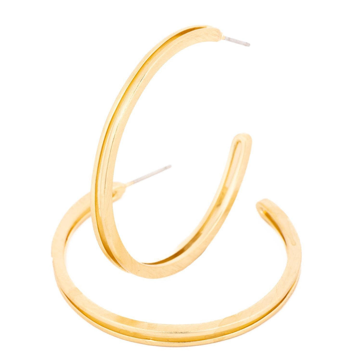Gold hoop earrings with a sleek circular silhouette.