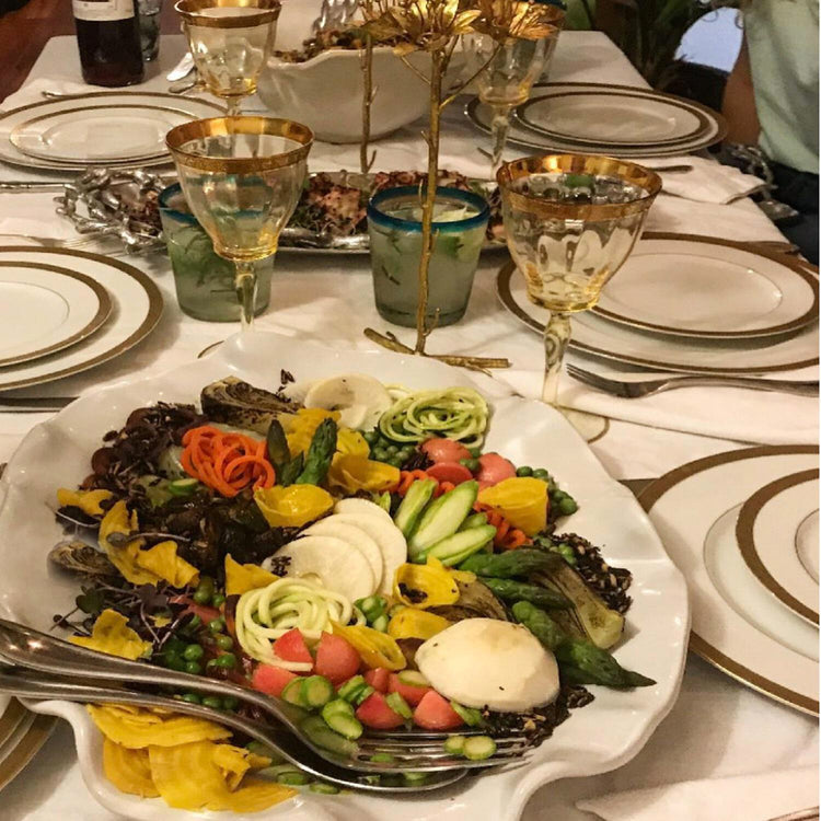 VIDA Havana White Round Platter with a colorful vegetable salad on a set dinner table.
