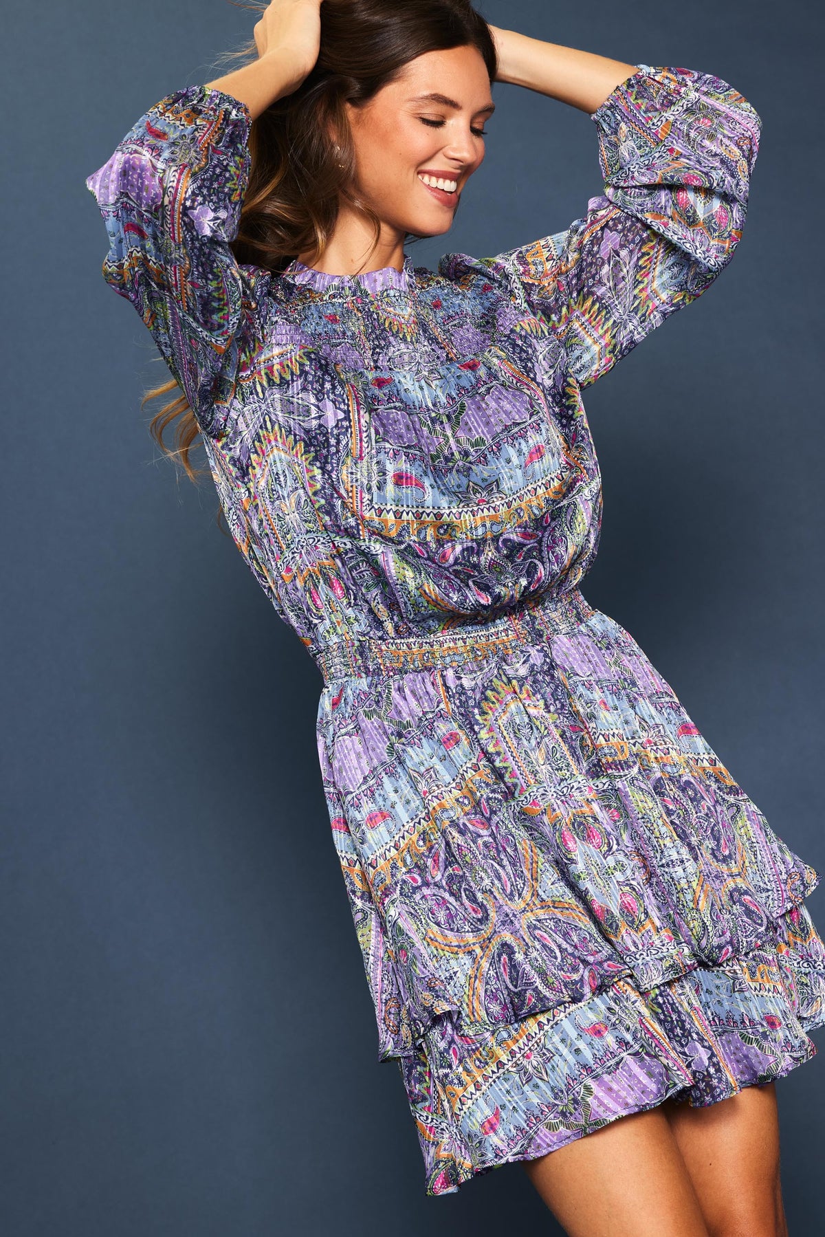 Lydia long sleeve mini dress in black polyester with white floral print.