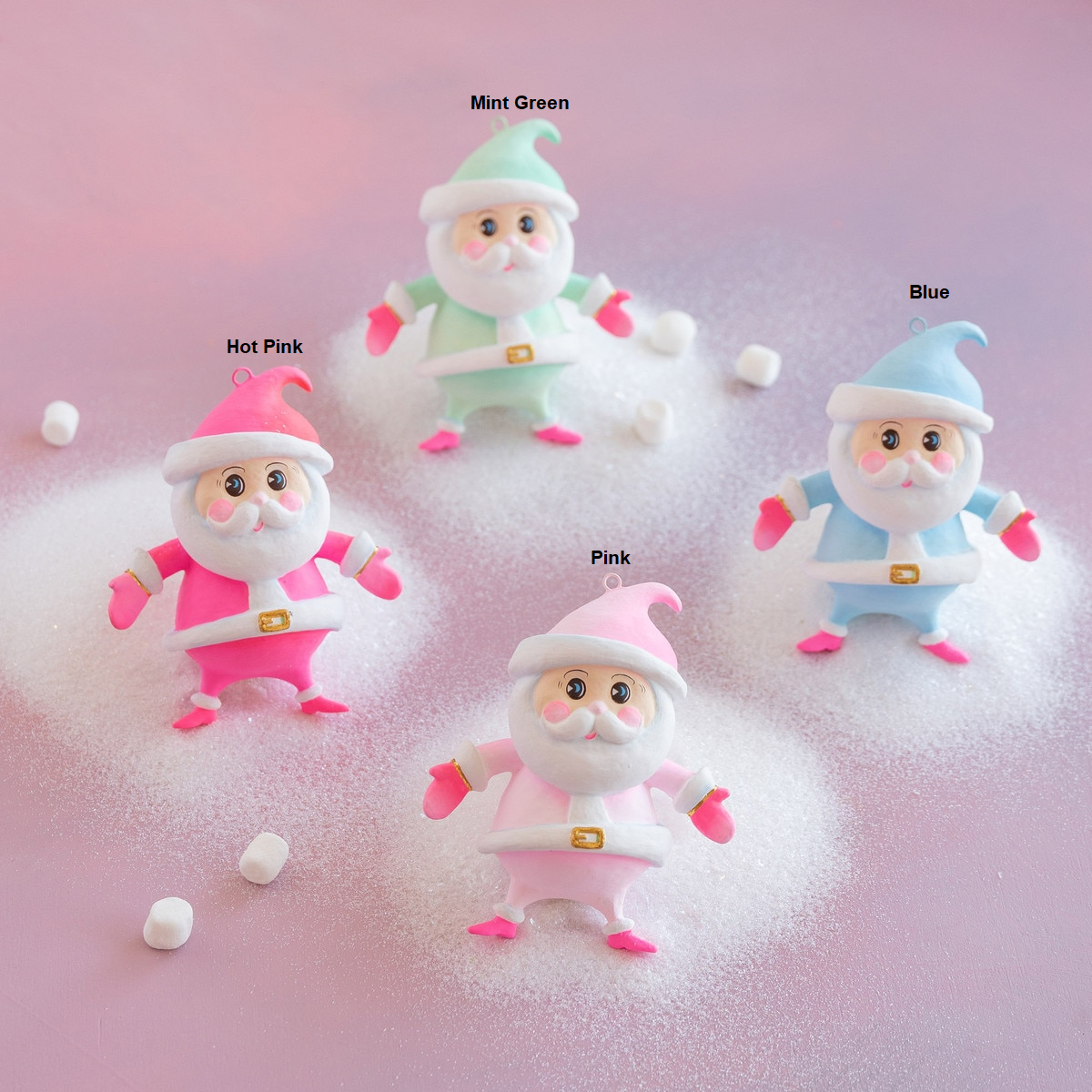 Rainbow resin ornament featuring a jolly Santa with cheerful face in festive rainbow colors.
