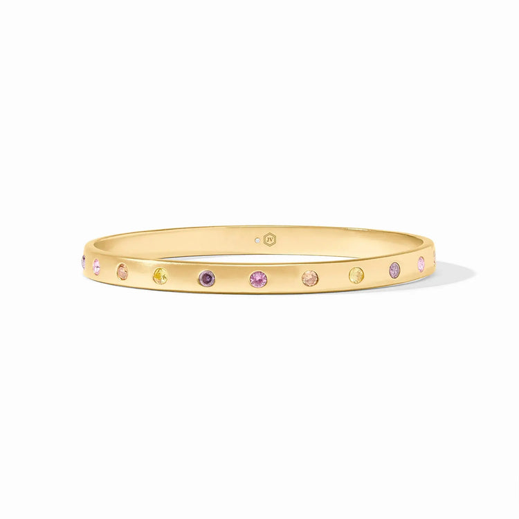 Rainbow bangle bracelet with pink dawn finish, gold plating, cubic zirconia stones, and a wide band silhouette.