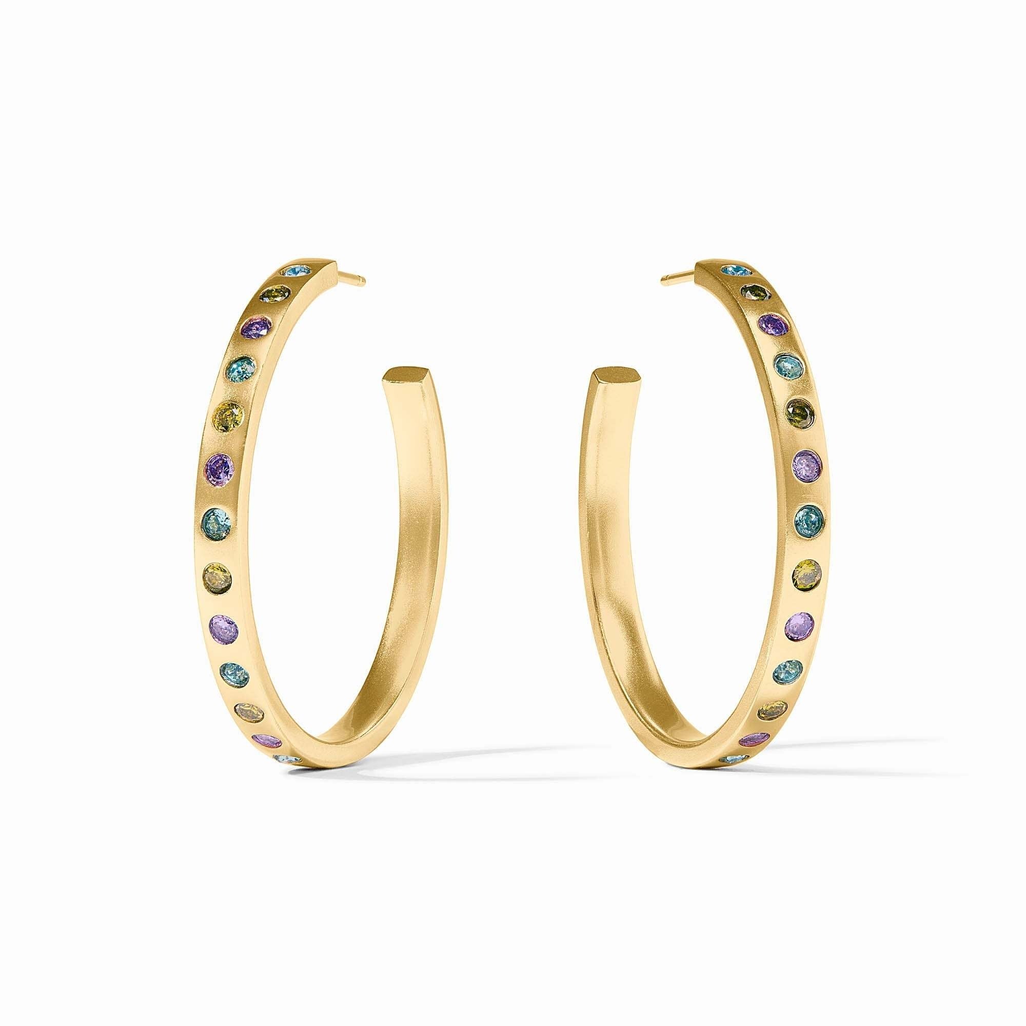 Large rainbow hoop earring with gold plating and blue CZ stones