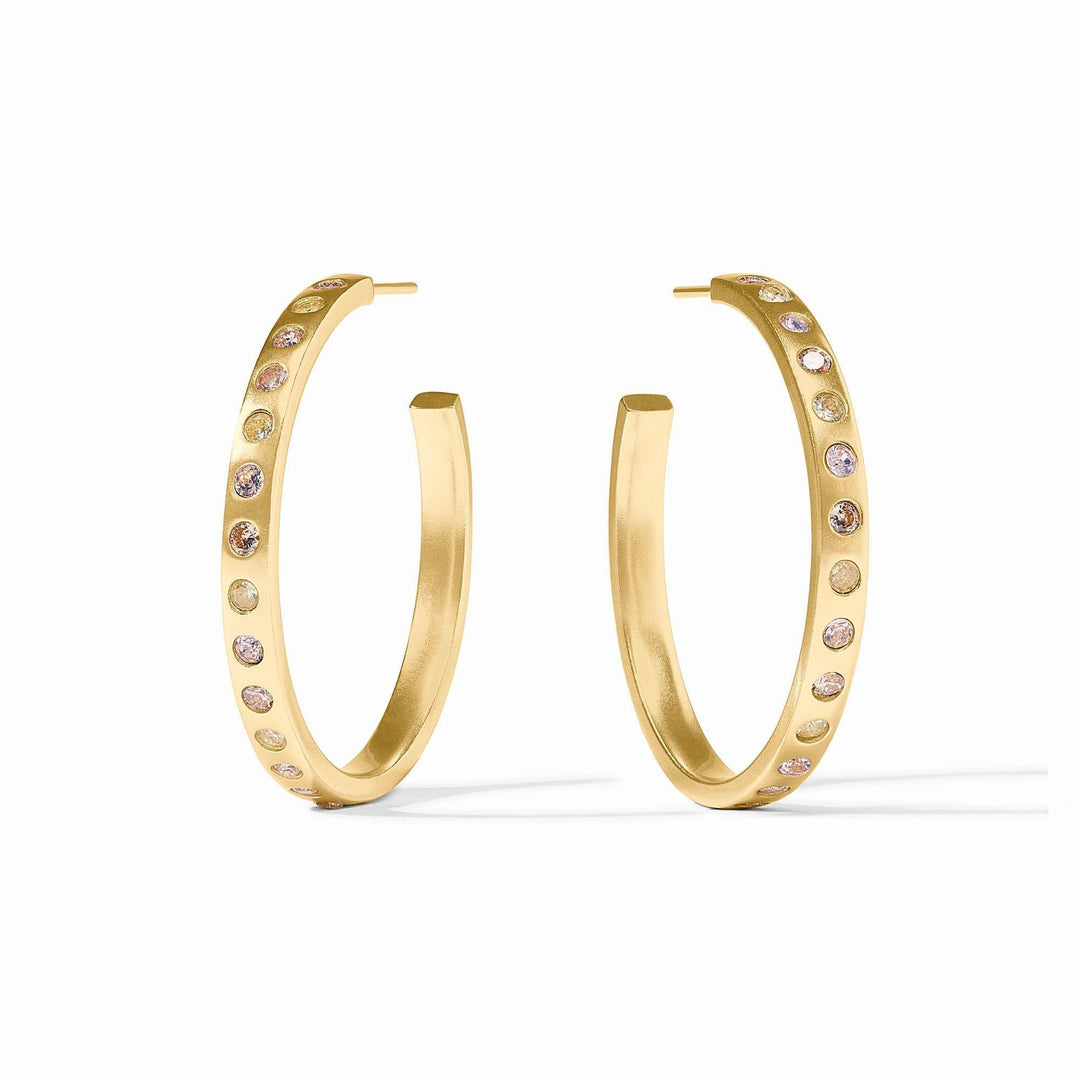 Large rainbow hoop earring with gold plating and clear cubic zirconia posts.