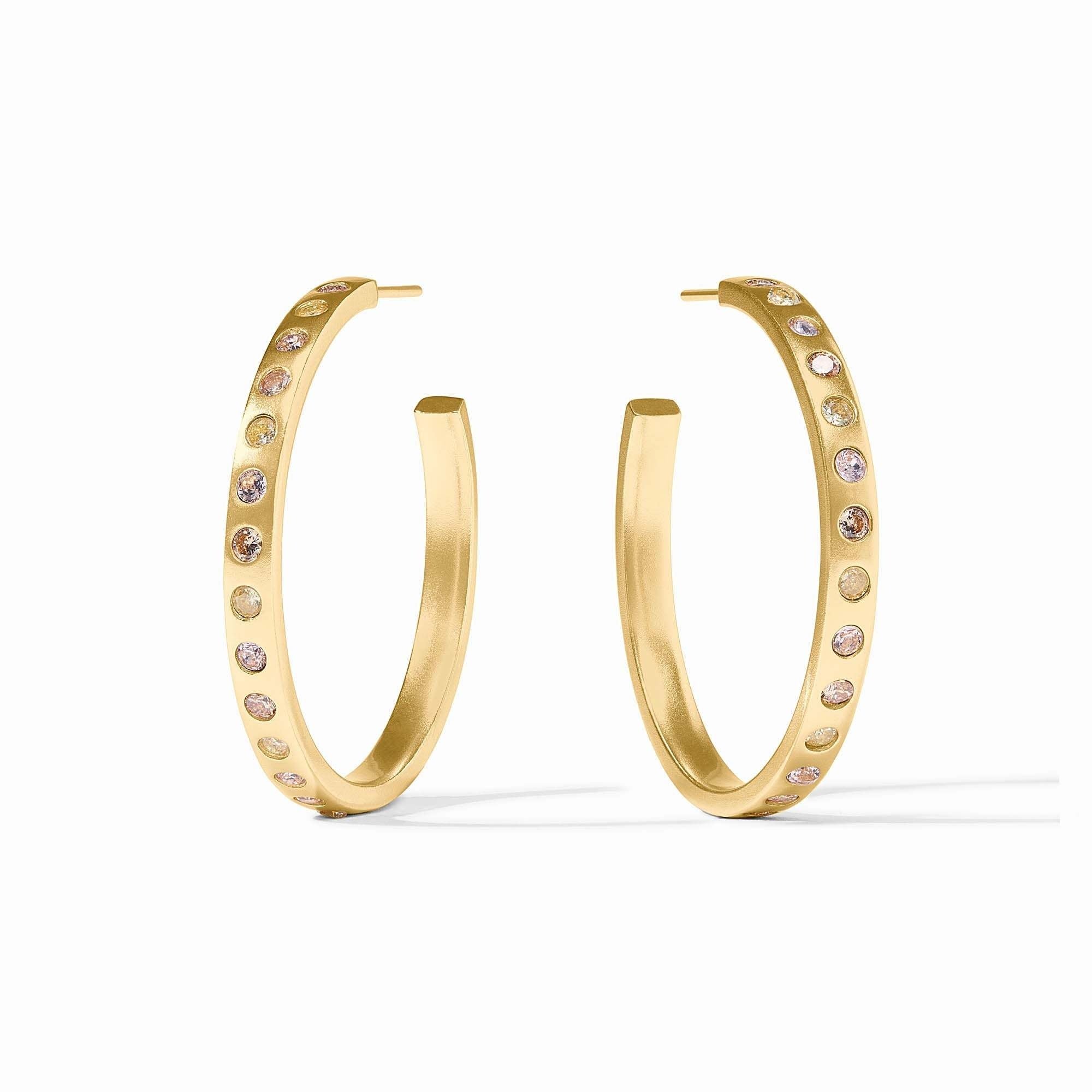 Large rainbow hoop earring with gold plating and clear cubic zirconia posts.