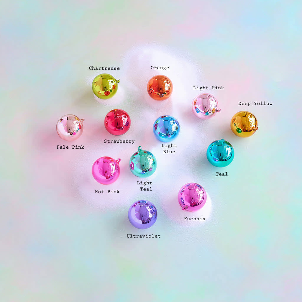 Handblown glass rainbow ball ornament with mirrored reflective surface