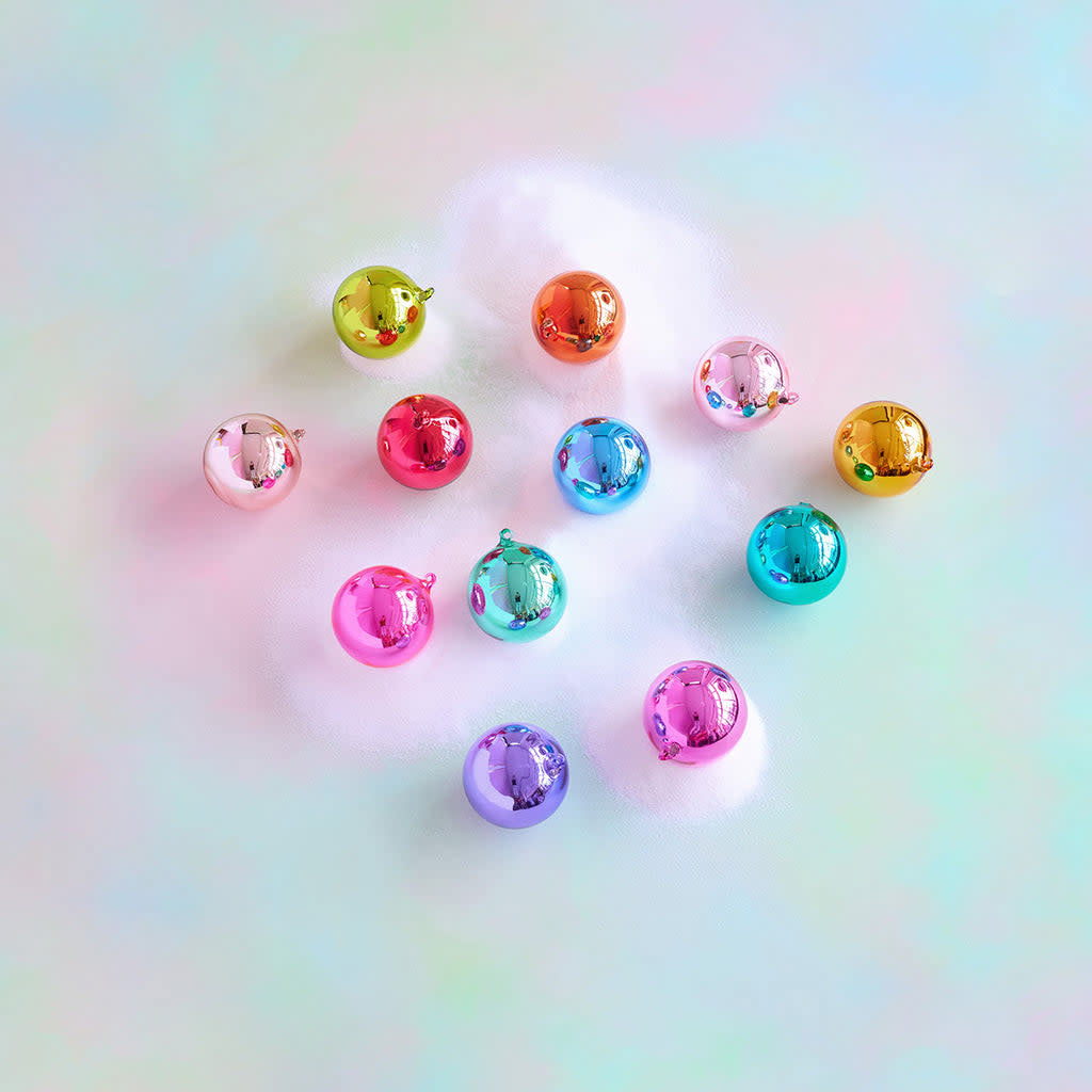 Handblown glass rainbow ball ornament with mirrored reflective surface