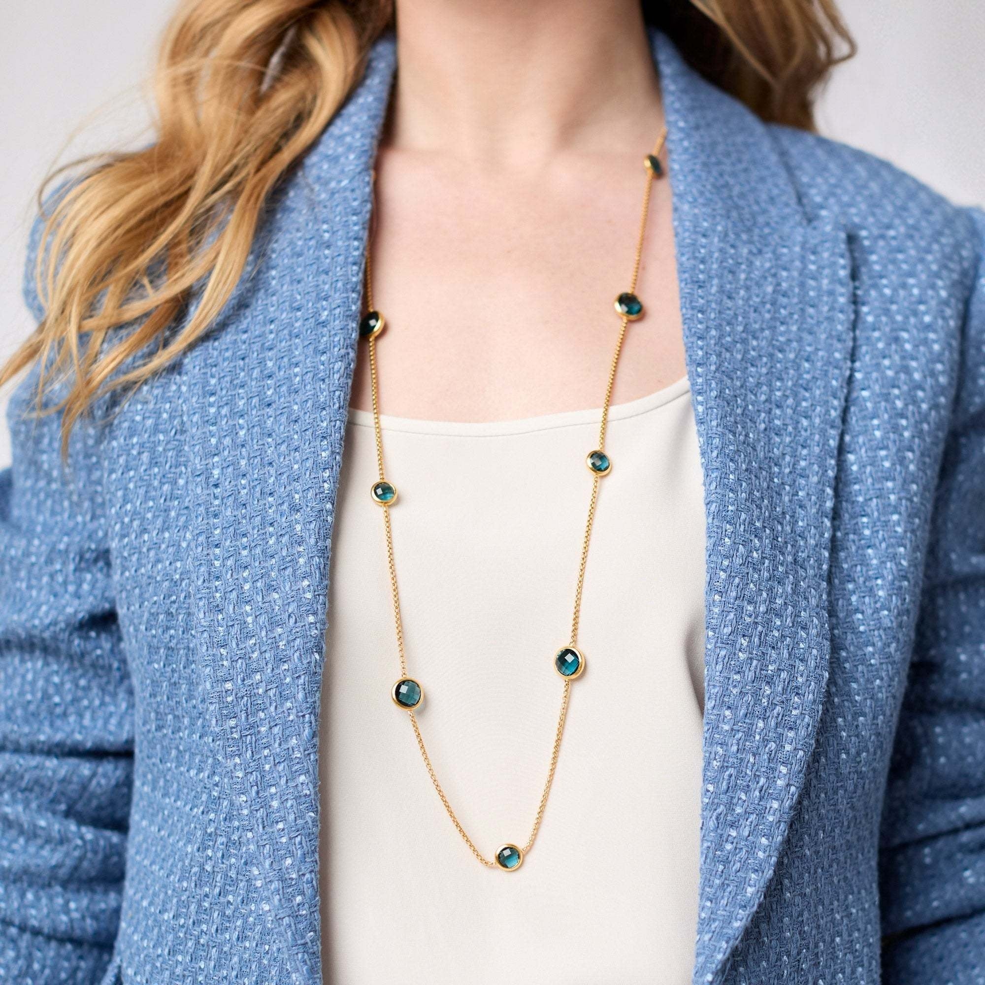 Rainbow Station necklace with vibrant glass beads on a gold-plated chain.