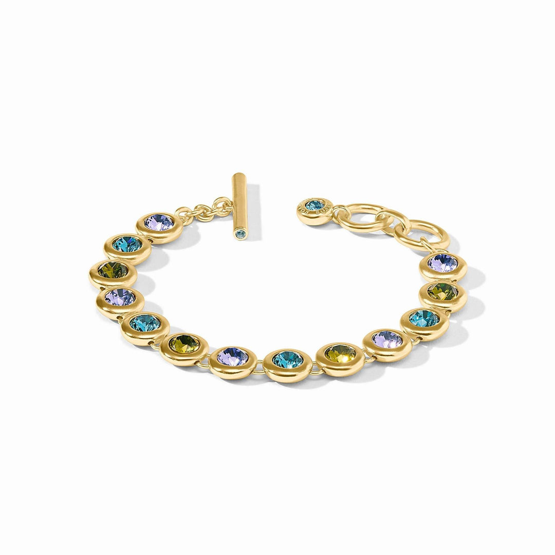 Adjustable rainbow tennis bracelet with toggle clasp featuring imported glass beads in blue twilight color.