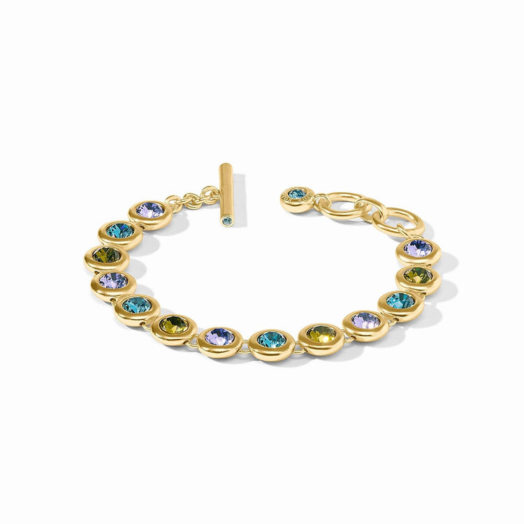 Adjustable rainbow tennis bracelet with toggle clasp featuring imported glass beads in blue twilight color.