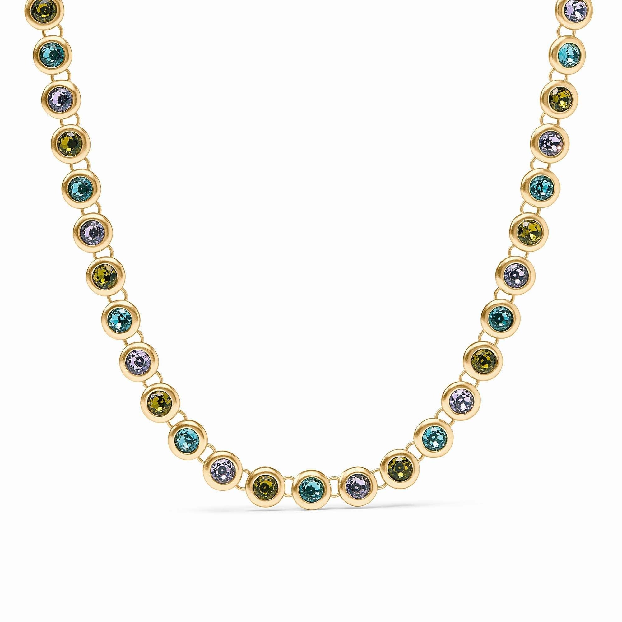Adjustable rainbow tennis necklace with vibrant stones on a 24K gold plate chain.