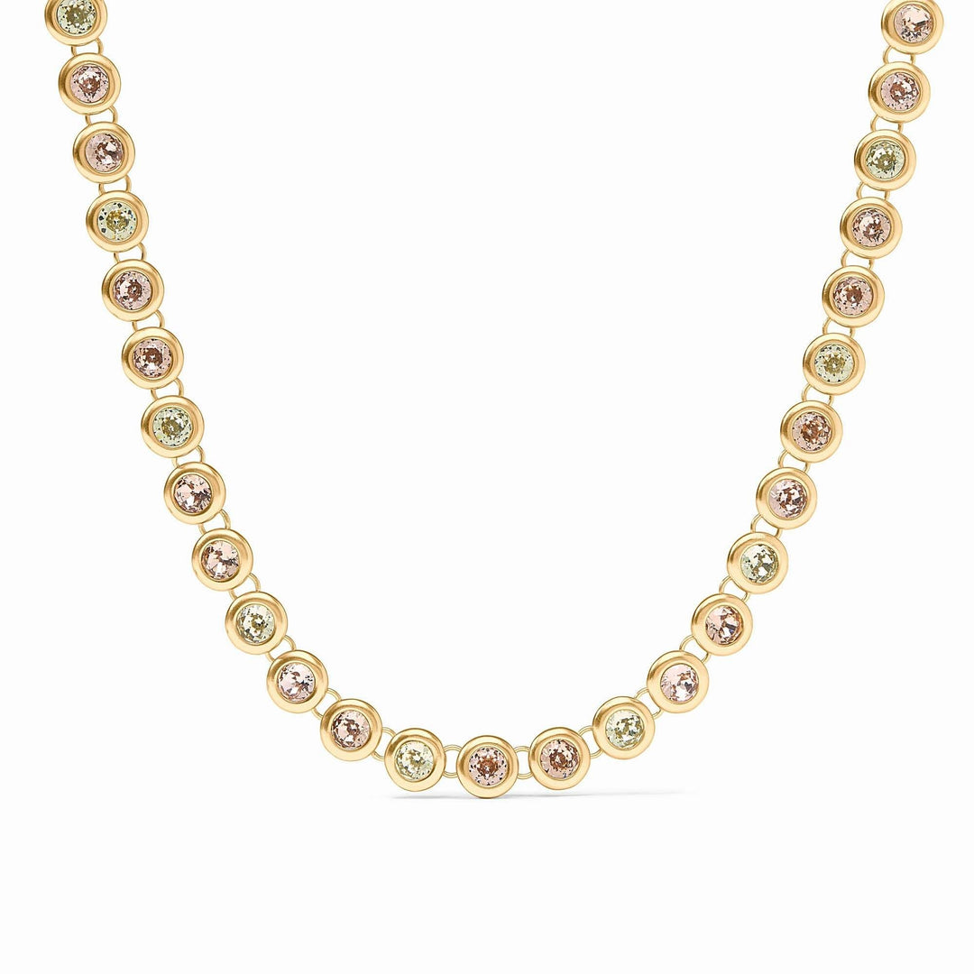 Adjustable rainbow tennis necklace with vibrant stones on a champagne gold plate chain