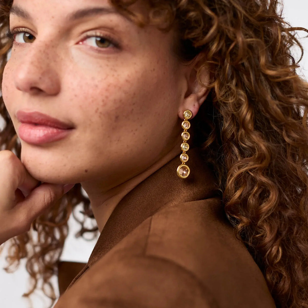Rainbow tier earring with imported glass stones on a gold-plated post.