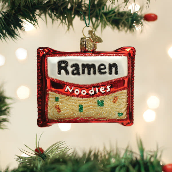 Decorative ornament shaped like a bowl of ramen noodles with broth and toppings.