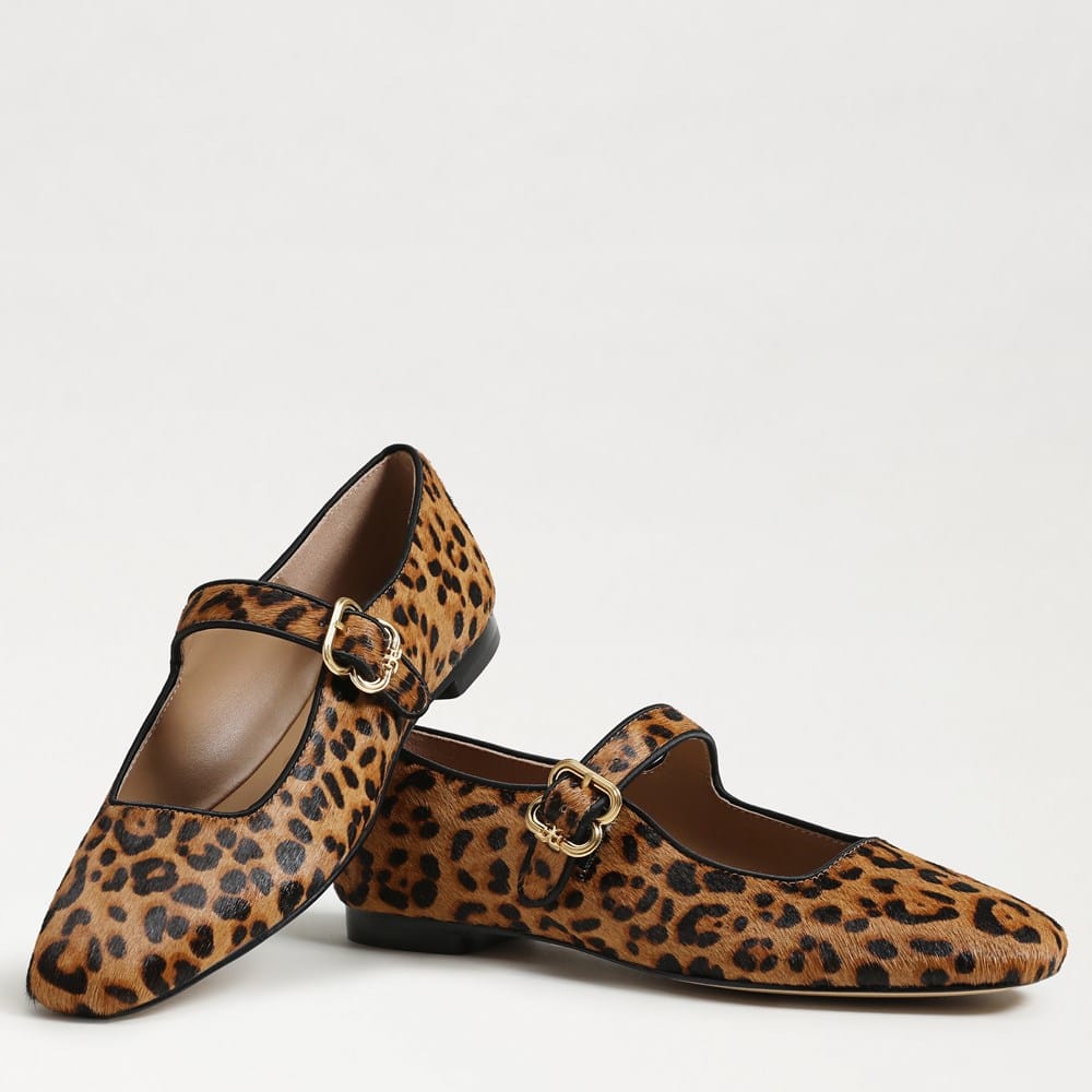 Leopard print Michaela Mary Jane flats with pointed toes and gold-tone buckles.