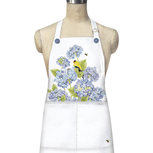 White apron with blue hydrangea flowers, a yellow finch, and two large front pockets.
