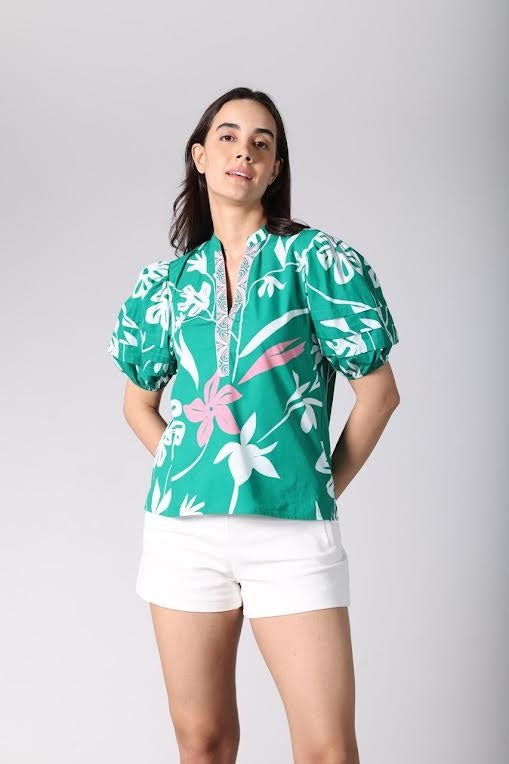 Mint green Raya top with lightweight fabric featuring a floral print.