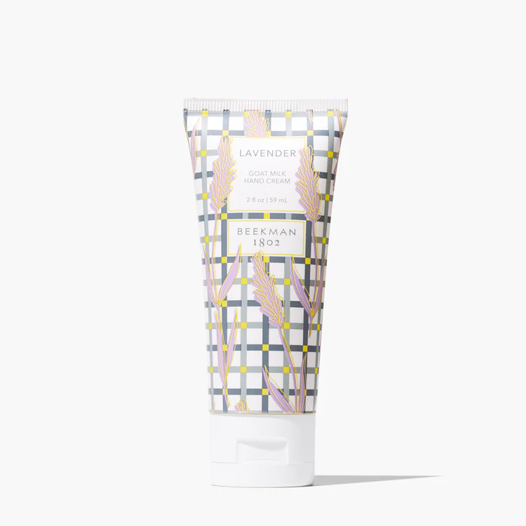 Beekman 1802 Lavender Goat Milk Hand Cream in a 2oz tube with a grey and yellow plaid pattern.