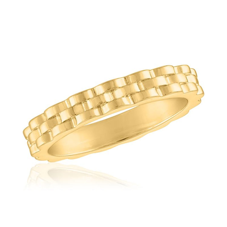 Yellow gold ring with a textured watch band link design on a white background.