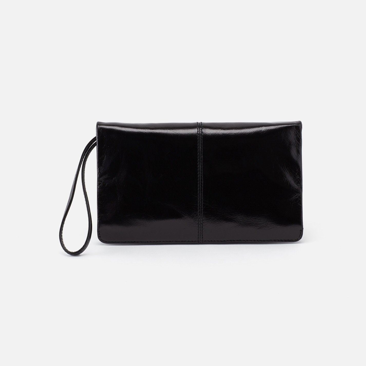 Evolve wristlet in solid leather with brushed antique brass hardware.