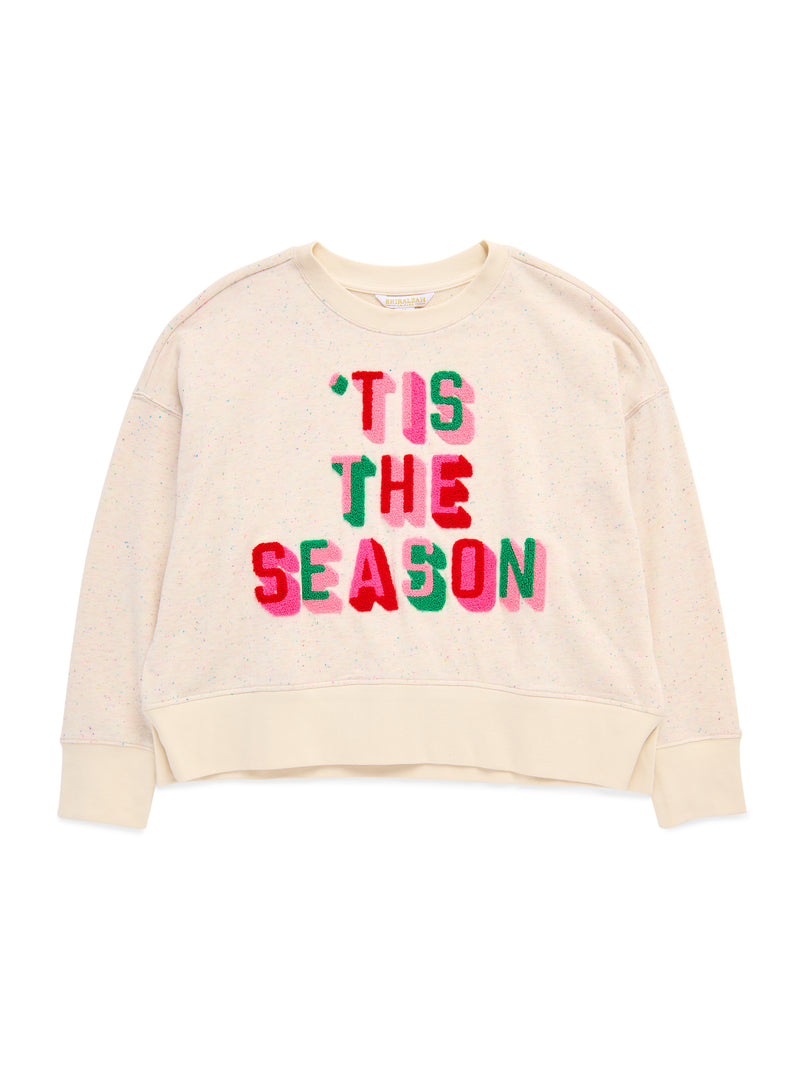 Cream relaxed sweatshirt with colorful chenille 'Tis The Season lettering and speckled fabric.