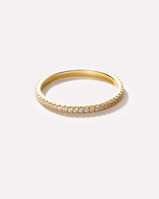 Celine Eternity ring in gold-tone metal with cubic zirconia stones set around the band.