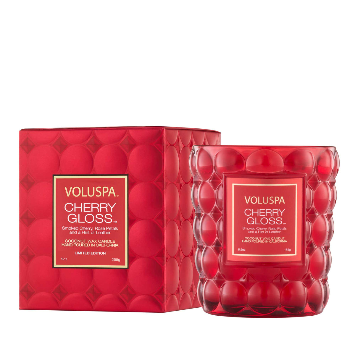 Cherry Gloss candle in a clear glass jar with a natural wick.