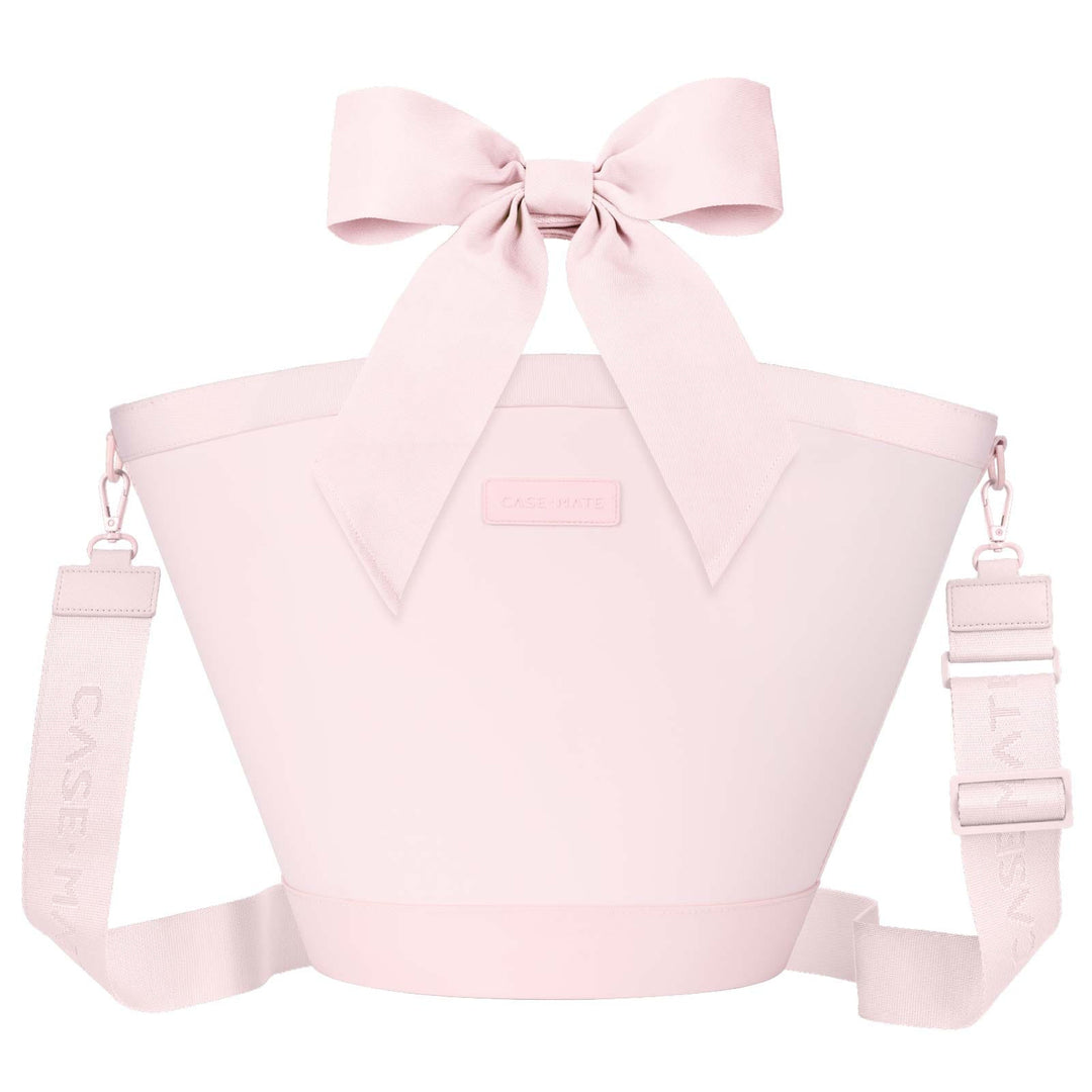 Ballet pink insulated cooler tote bag with a large decorative bow and adjustable shoulder strap.