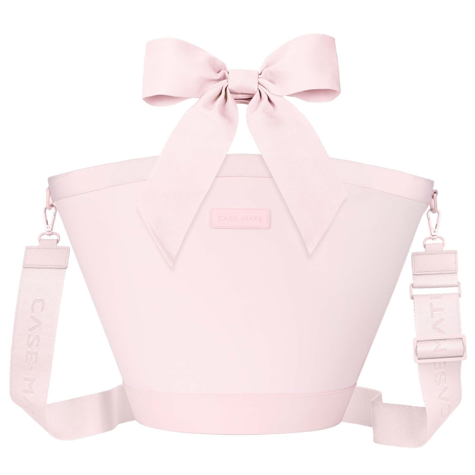 Ballet pink insulated cooler tote bag with a large decorative bow and adjustable shoulder strap.