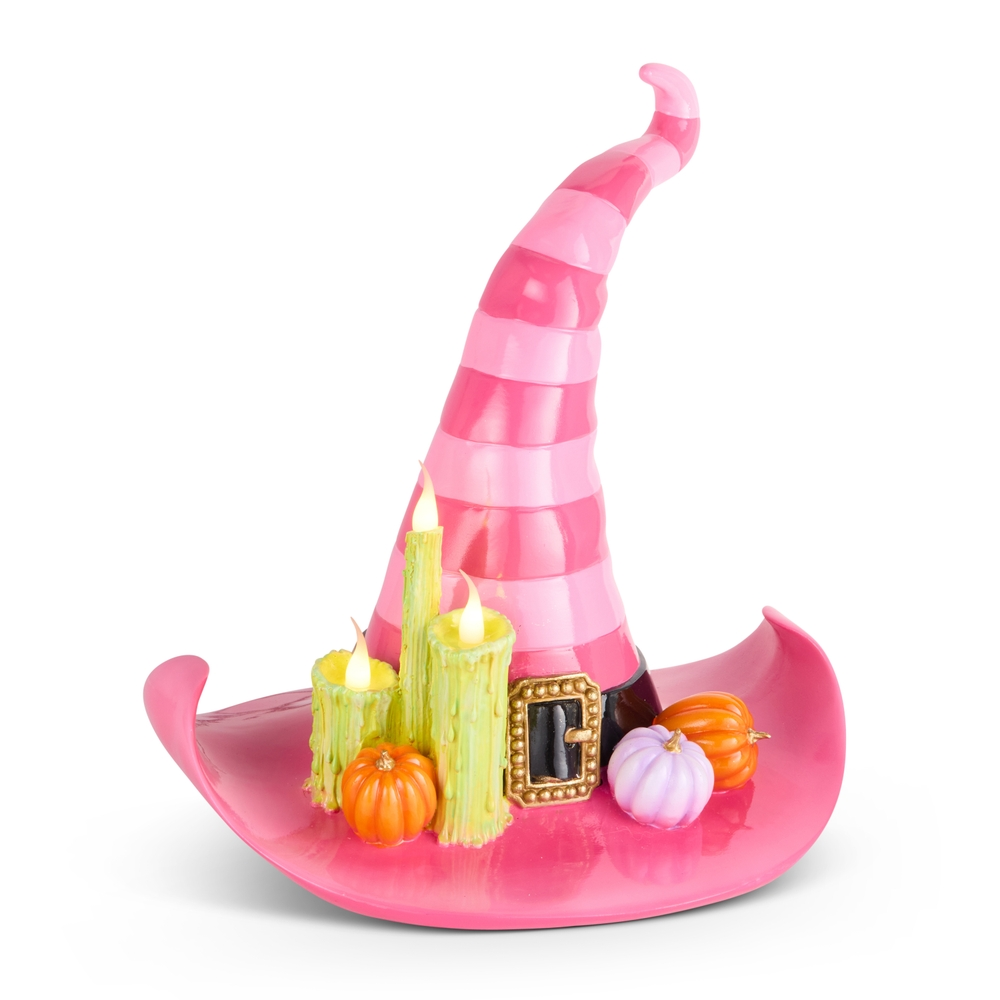 16-inch pink striped witch hat decoration with glowing green candles and small pumpkins on the brim.