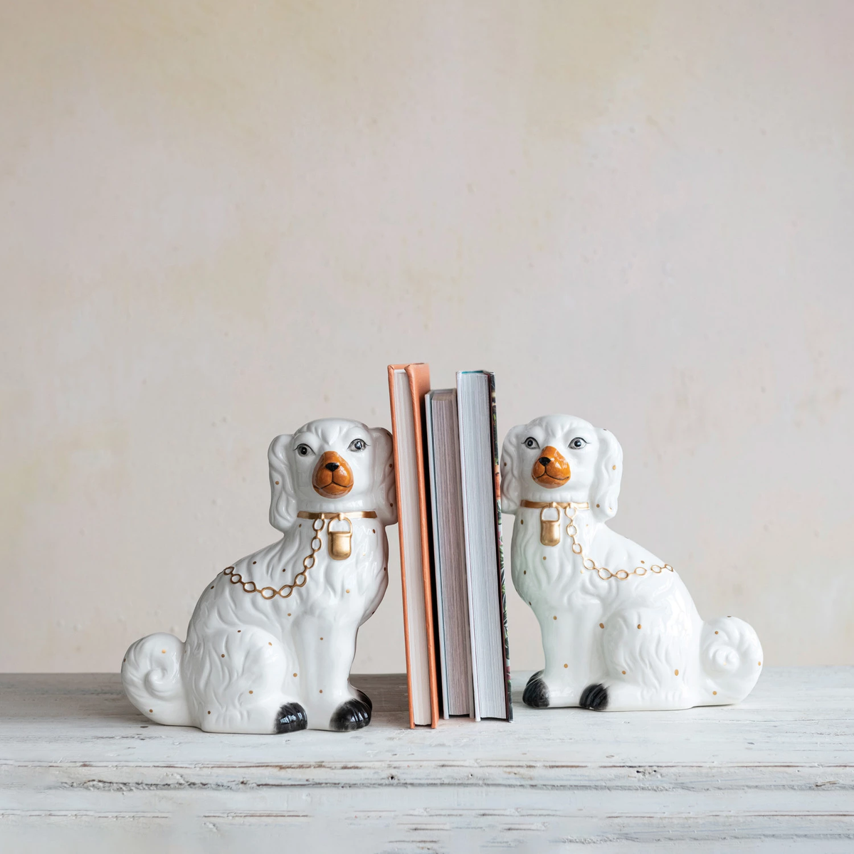 Hand-painted vintage Staffordshire figurine made from dolomite with a natural stone finish and classic silhouette.