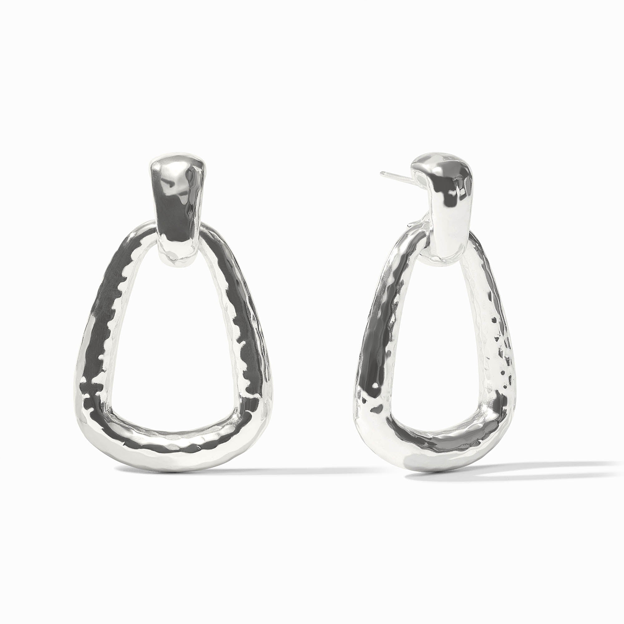 Sahara Doorknocker Earrings in silver with a hammered texture and triangular drop design.